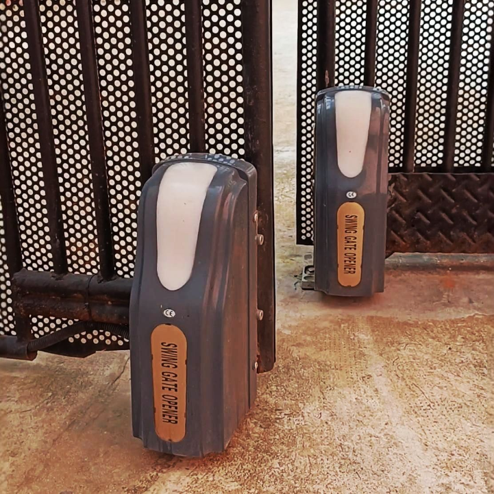 A pair of Rolling motors installed on a gate.