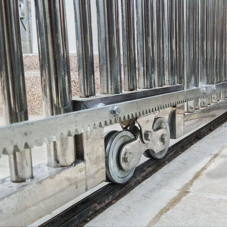 A gate with racks and twin wheel